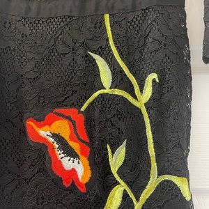 Black lace w/ large embroidered flower